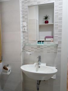 Koupelna v ubytování Apartments Mila + 30 fotografií
