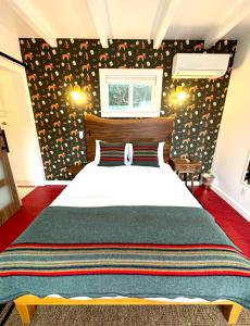 a bedroom with a large bed in a room at Charismatic Downtown Solvang Pet-Friendly Studio in Solvang