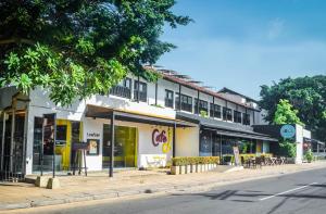 a building on the side of a street at Blue Breeze - Jetwing Select in Negombo