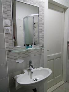 Koupelna v ubytování Apartments Mila