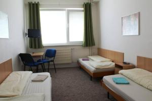 Een bed of bedden in een kamer bij Hostel Narva