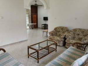 Posezení v ubytování Homestay Rumah Rehat Seri Anggerik