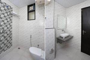 Koupelna v ubytování Hotel O M SUITES