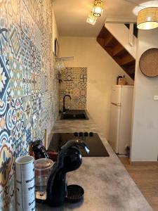 Kuchyň nebo kuchyňský kout v ubytování Appartement T2 La Saline Les Bains