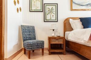 Giường trong phòng chung tại Villa Maria