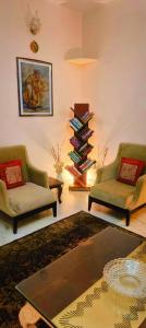 Posezení v ubytování Roots Ashiana