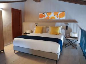 Postel nebo postele na pokoji v ubytování Tradere Hotel Boutique