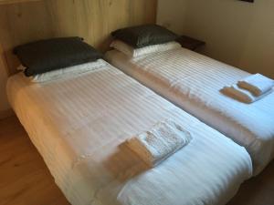 Cama ou camas em um quarto em Sherpa