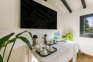 Příslušenství pro přípravu čaje a kávy v ubytování Hotel Boomerang Roma