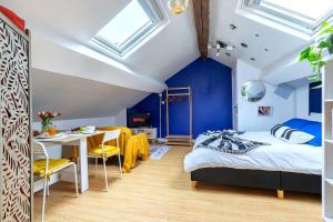 En eller flere senge i et værelse på Le Nid Chromatique, Hyper Centre Palaiseau