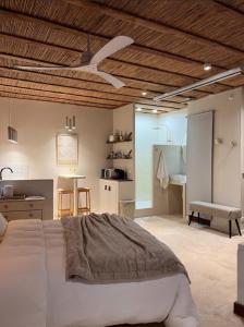 Ένα ή περισσότερα κρεβάτια σε δωμάτιο στο Loft Balneo