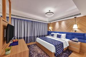 Clarion Hotel Khayal Kochi, Infopark客房内的一张或多张床位