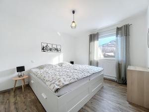 Postel nebo postele na pokoji v ubytování Hopla Gîte