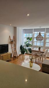 TV a/nebo společenská místnost v ubytování Vivienda en el centro de la ciudad