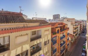 a view of a city street with buildings at 3 Bedroom Cozy Apartment In Torrevieja in Torrevieja +17 photos