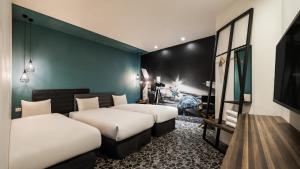 凝萃文旅 台中車站店 NCH-Business Hotel客房内的一张或多张床位