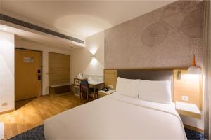 Postel nebo postele na pokoji v ubytování Holiday Inn Express Chennai OMR Thoraipakkam by IHG + 37 fotografií