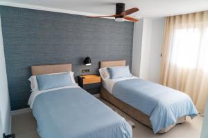 Postel nebo postele na pokoji v ubytování Luxury penthouse 3 bedrooms, large terrace, barbecue, near beach and Shopping Center - La Zenia