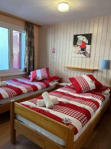 Postel nebo postele na pokoji v ubytování Hotel Rhoneblick