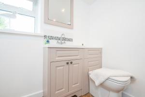 Phòng tắm tại Minim Cottage +17 ảnh