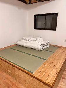 Fotografie z fotogalerie ubytování Guest House & Cafe Yamaboushi v destinaci Cušima