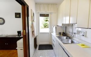 Kuchyň nebo kuchyňský kout v ubytování Apartment Diva