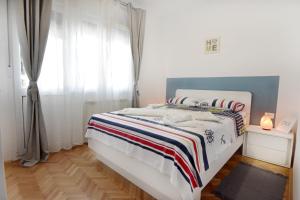 Postel nebo postele na pokoji v ubytování Apartment Diva