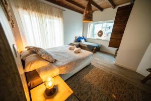Postel nebo postele na pokoji v ubytování Alex Surf Hostel