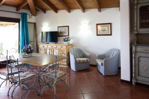 Et tv og/eller underholdning på Villa il Rosmarino