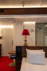 Postel nebo postele na pokoji v ubytování !FEST Hotel Rynok Square