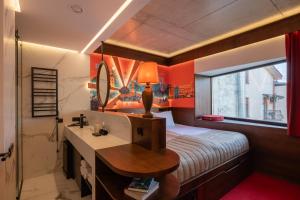Postel nebo postele na pokoji v ubytování !FEST Hotel Rynok Square