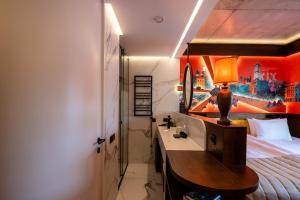 Postel nebo postele na pokoji v ubytování !FEST Hotel Rynok Square