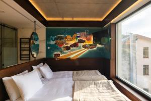 Postel nebo postele na pokoji v ubytování !FEST Hotel Rynok Square