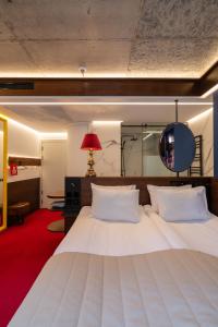 Postel nebo postele na pokoji v ubytování !FEST Hotel Rynok Square