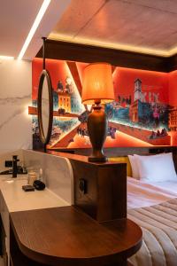 Postel nebo postele na pokoji v ubytování !FEST Hotel Rynok Square