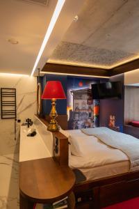 Postel nebo postele na pokoji v ubytování !FEST Hotel Rynok Square