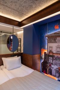 Postel nebo postele na pokoji v ubytování !FEST Hotel Rynok Square