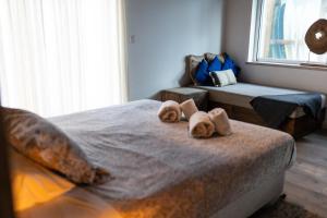 Postel nebo postele na pokoji v ubytování Alex Surf Hostel