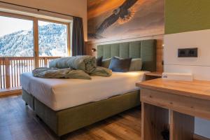 Postel nebo postele na pokoji v ubytování Aparthotel Fernblick