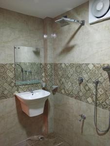 Koupelna v ubytování Cha Cha Guest House