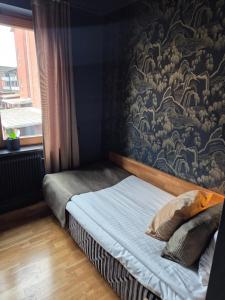 Stora Hotellet Osby酒店 客房内的一张或多张床位