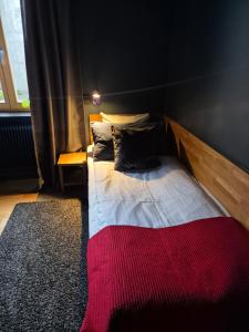 Stora Hotellet Osby酒店 客房内的一张或多张床位