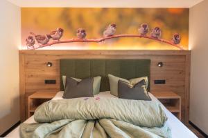 Postel nebo postele na pokoji v ubytování Aparthotel Fernblick