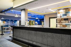 A restaurant or other place to eat at Villa Sunflower Hotel - All Inclusive