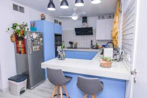 Kuchnia lub aneks kuchenny w obiekcie Dúplex El paseo Marítimo