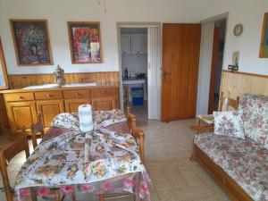 Posteľ alebo postele v izbe v ubytovaní CASA CAMELIA