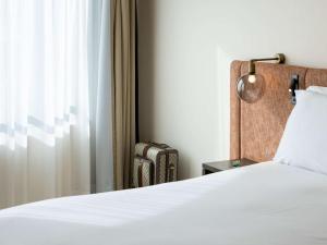 Postel nebo postele na pokoji v ubytování Sofitel Brussels Europe