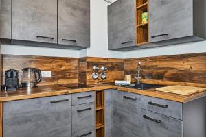 Kuchyň nebo kuchyňský kout v ubytování Ferienwohnung Loferblick