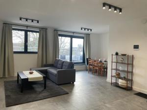 Posezení v ubytování Splendide appartement neuf à Zaventem airport
