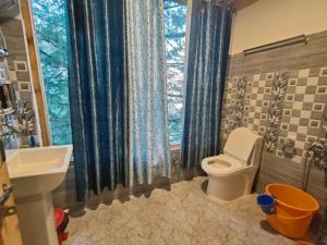 Ένα μπάνιο στο Shreya cozy hut